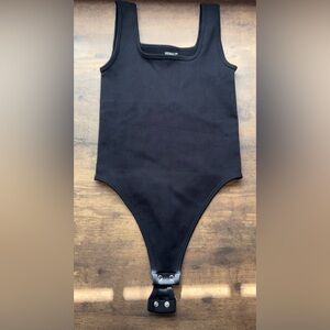NWOT Woman’s Black One Piece Compression Thong Bodysuit